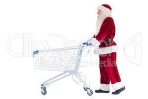 Santa pushes a shopping cart