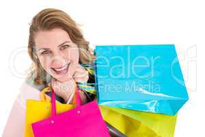 Overhead of a woman holding many shopping bags