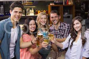 Young friends having a drink together