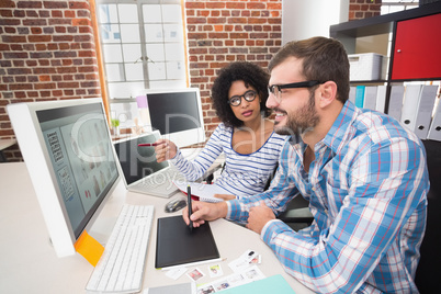 Photo editors using digitizer in office