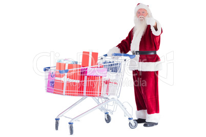 Santa likes to push a shopping cart with presents