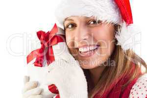 Portrait of smiling young woman holding gift