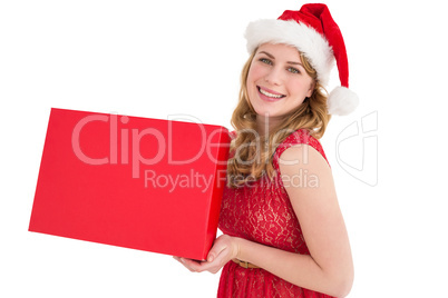 Pretty blonde in red dress holding a box