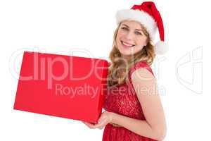 Pretty blonde in red dress holding a box