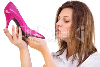 Close up of a young woman about kissing a shoes