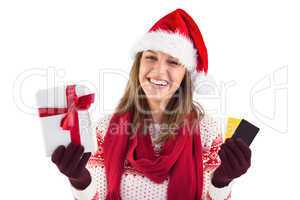 Smiling young brunette with gift and credit card