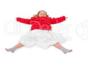 Cute little girl lying on floor