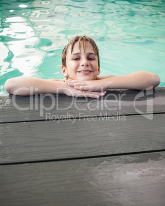 Little boy smiling in the pool