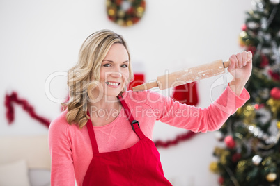 Festive blonde making christmas cookies