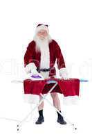 Santa is ironing his pants