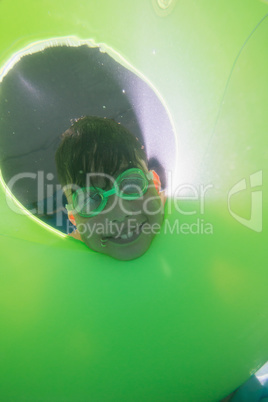 Cute kid posing underwater in pool