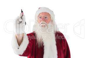 Santa writes something with a pen