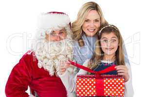 Mother and daughter with santa claus