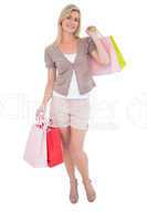 Happy blonde with shopping bags