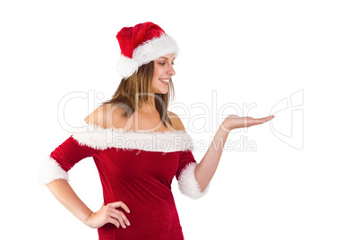 Festive girl presenting with hand