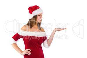 Festive girl presenting with hand