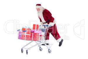 Santa rides on a shopping cart