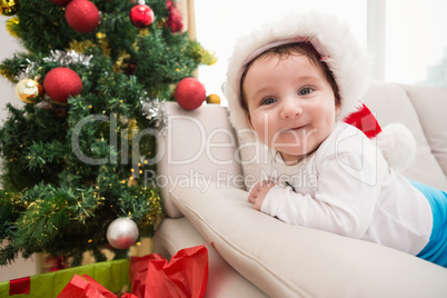 Cute baby boy on couch at christmas