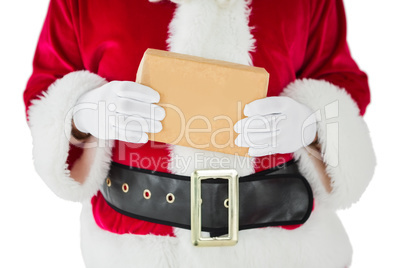 Mid section of santa claus holding box