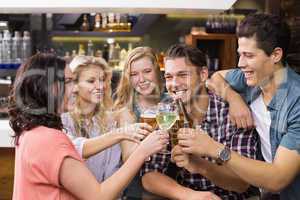 Young friends having a drink together