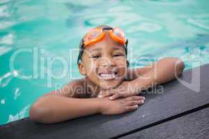 Little boy smiling in the pool