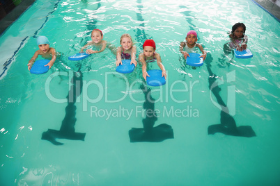 Cute little kids in the swimming pool