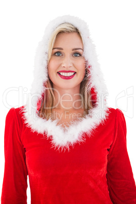 Festive blonde smiling at camera