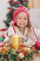 Cute little girl smiling at Christmas