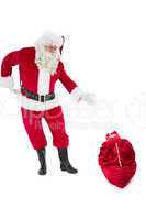 Santa claus showing sack full of gifts