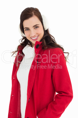 Smiling brunette posing with winter wear