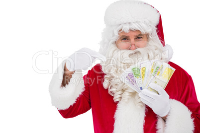 Santa claus pointing his cash