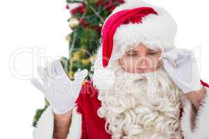 Concentrated santa claus doing gesture
