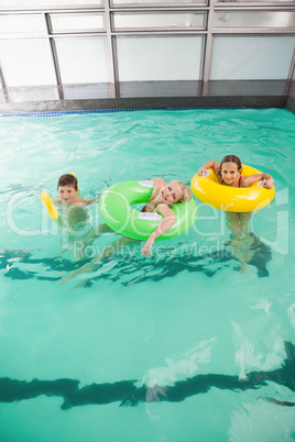 Cute little kids in the swimming pool