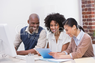 Business people using digital tablet in office