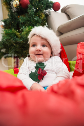 Cute baby boy in large christmas present