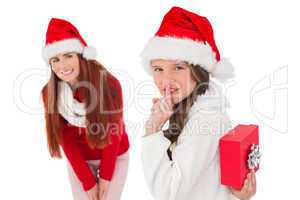 Mother and daughter with christmas gift