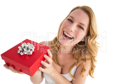 Portrait of a happy woman receiving a present