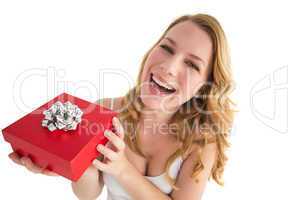 Portrait of a happy woman receiving a present