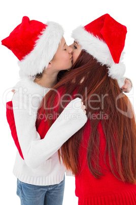 Festive mother giving daughter a hug