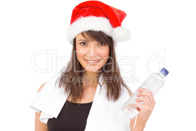 Festive fit brunette smiling at camera