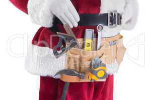 Father Christmas is wearing a tool belt