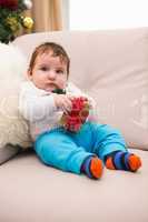 Cute baby boy on the couch at christmas