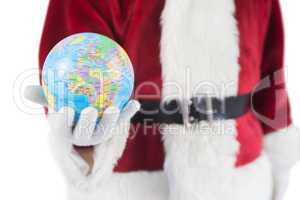 Santa has a globe in his hand