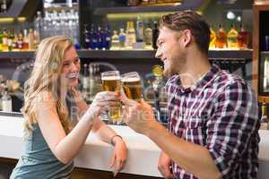 Young couple having a drink together