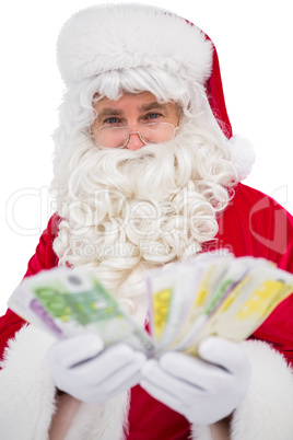 Happy santa claus showing his cash