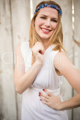 Portrait of a smiling blonde woman wearing headband