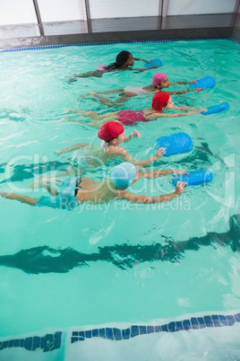 Cute little kids in the swimming pool