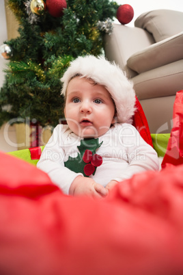 Cute baby boy in large christmas present