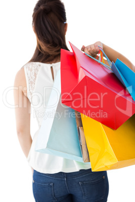 Rear view of brown hair holding shopping bags