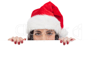 Festive brunette showing white poster